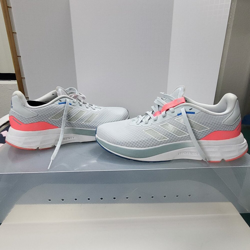 Adidas ladies white sneakers with blue and orange accents hard to find size 10.5